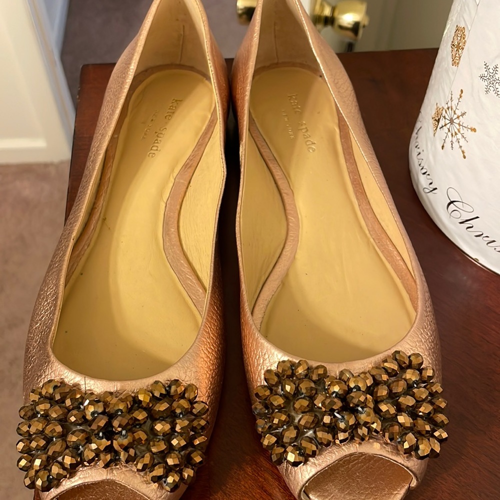 Kate spade never worn. Slight blemish